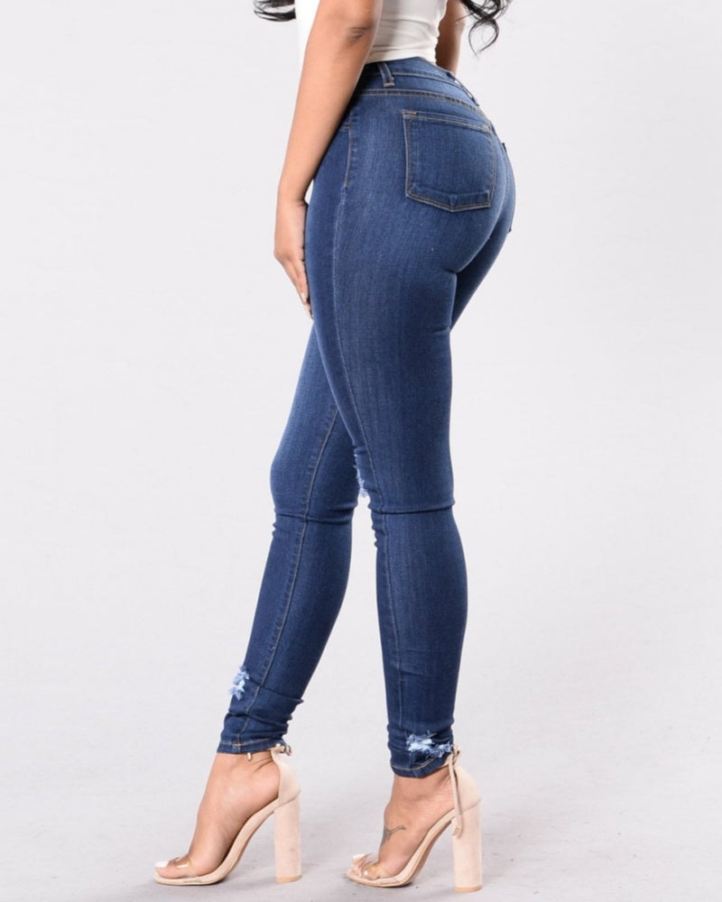 Zerrissene Skinny Slim Fit Jeans mit Ausgefransten Kanten und Stretchanteil