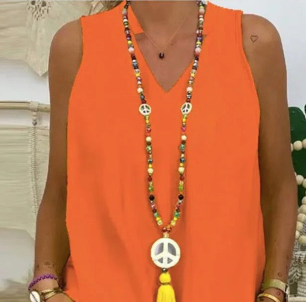 Zweiteiliges Set mit ärmellosem Druck in Orange