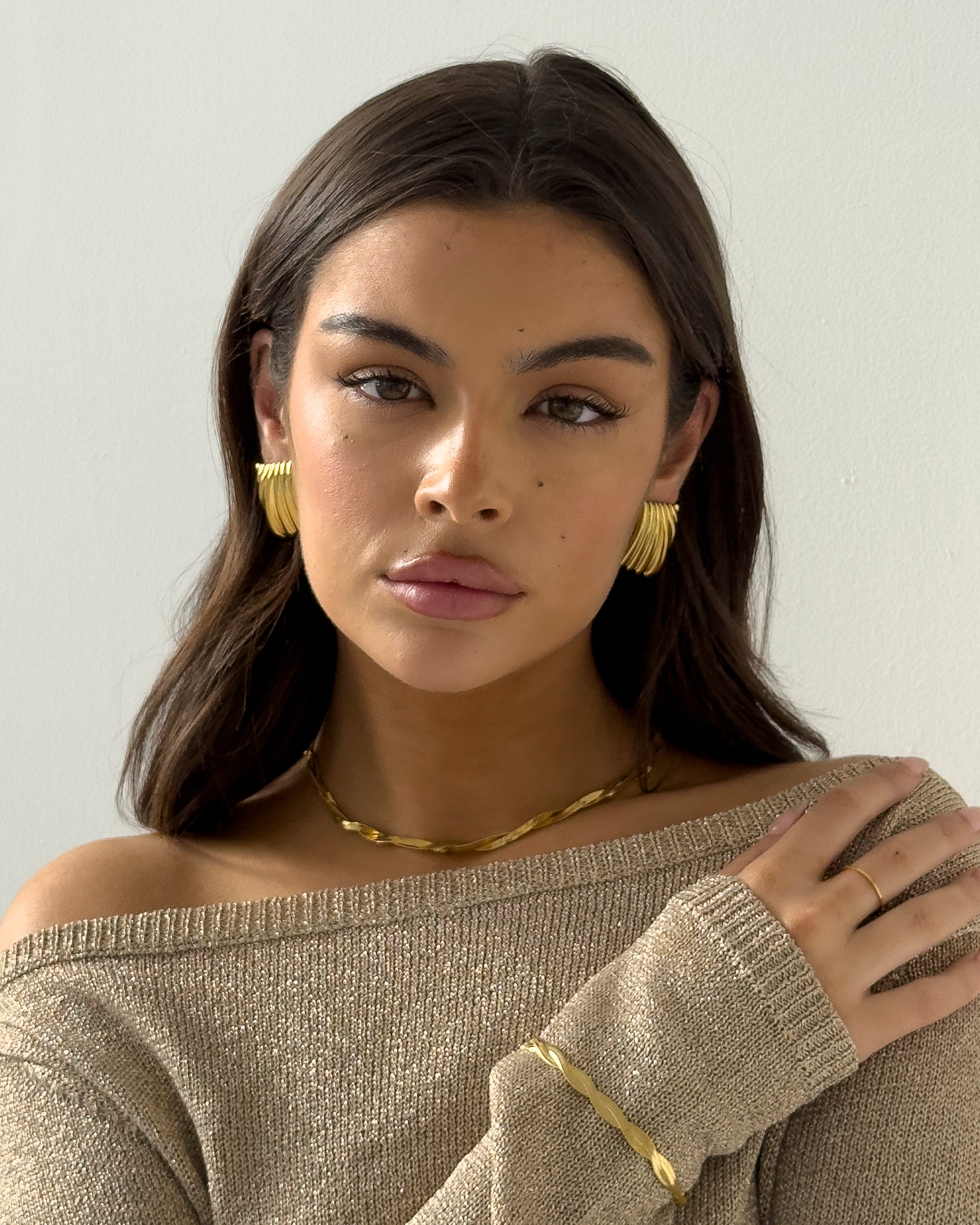Goldener Ripple-Ring – Elegantes Design mit wellenförmigen Details