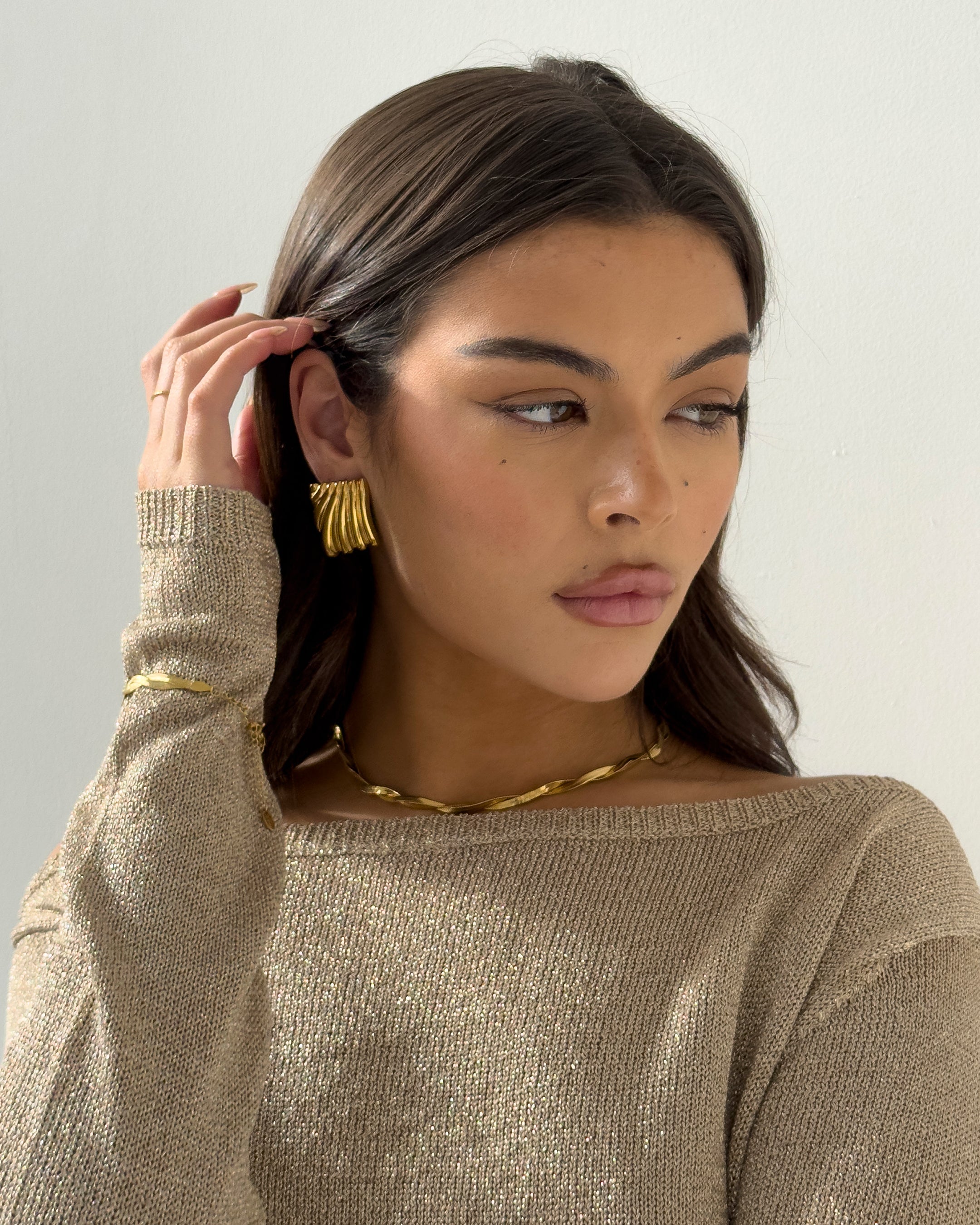 Goldener Ripple-Ring – Elegantes Design mit wellenförmigen Details