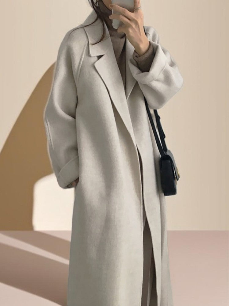 Langer Damenmantel Beige Wolle Tailliert für Winter Eleganz