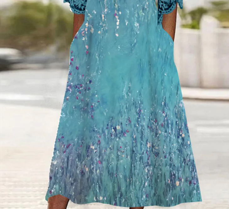 Wunderschönes Midikleid mit halben Ärmeln und Seitentaschen in Blau